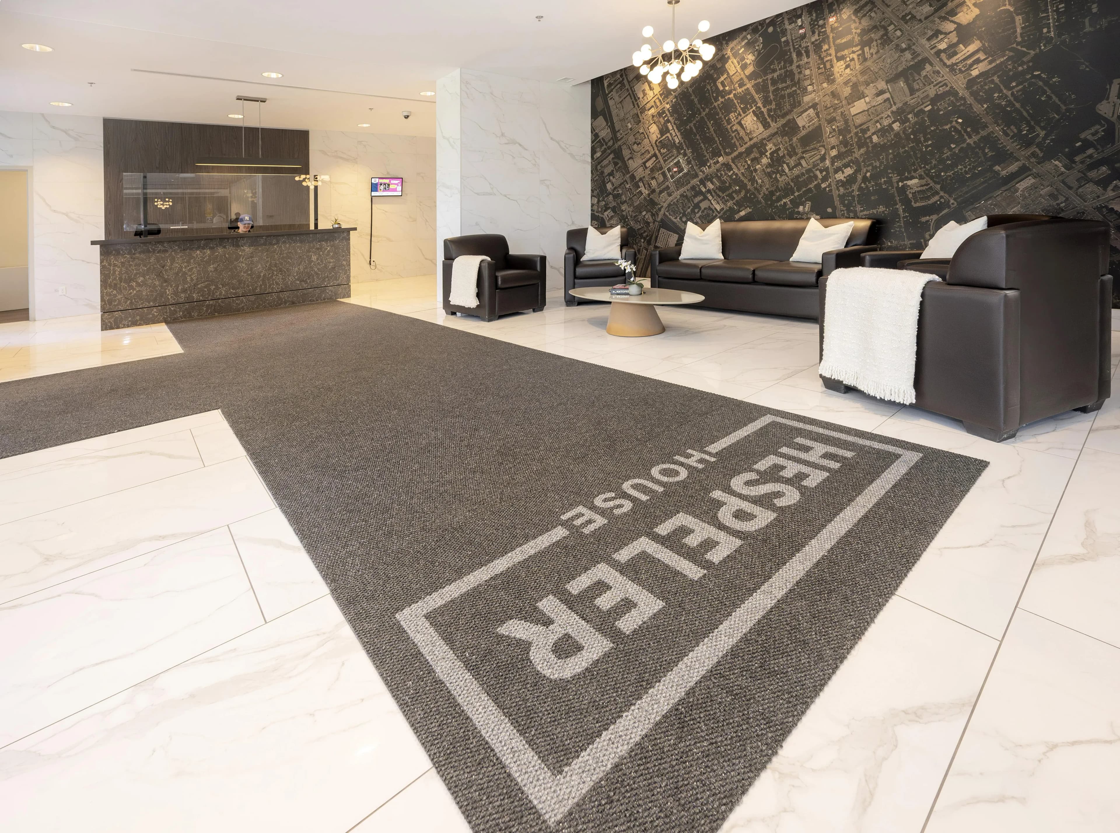 Elegant lobby featuring sleek modern furniture and marble flooring