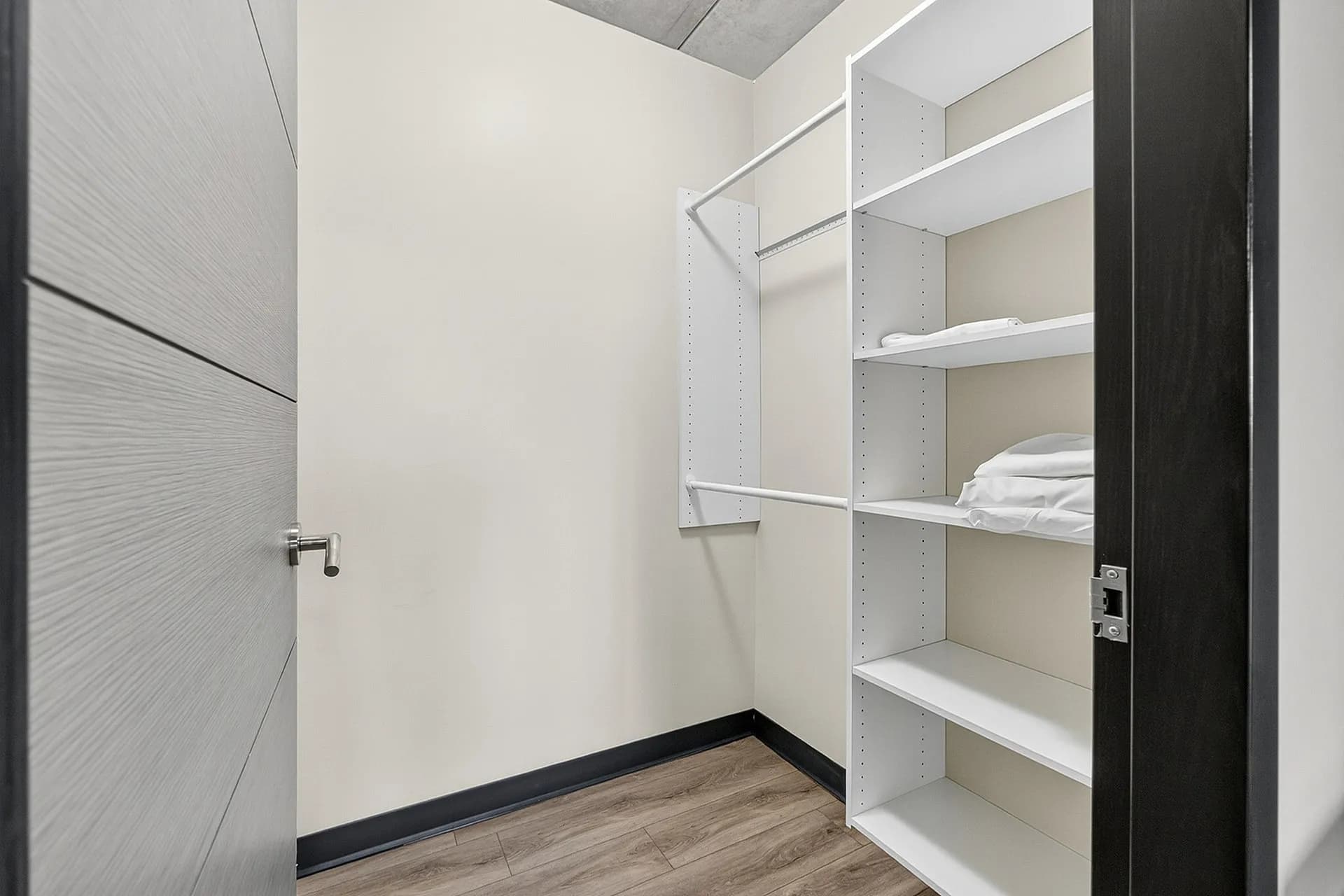 Spacious walk-in closet with organized storage