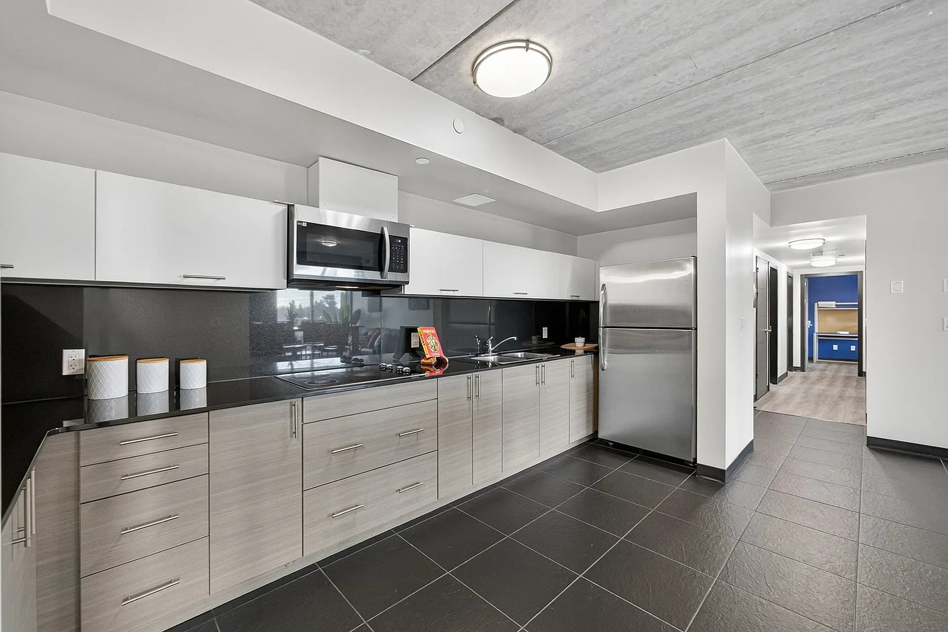 Sleek modern kitchen with stainless steel appliances and elegant countertops